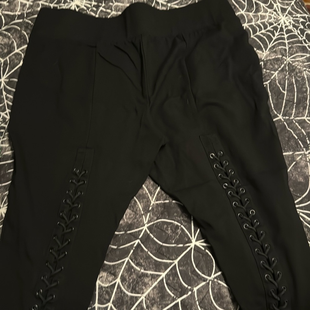 Torrid black slim ankle pants lace up back! Size 2
